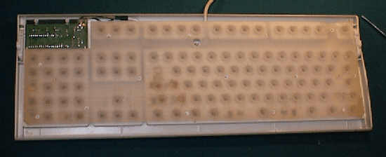 Rubber sheet under keys